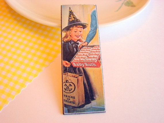 Girl in a Witch Costume and Baby Ruth Candy Bars by mimiandlucy