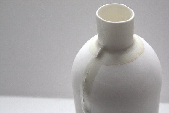 Fine bone china white bottle with dripping glaze by madebymanos