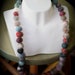 Felt Pearl Necklace, multi coloured with green glass and labrodite strung on stainless steel wire