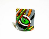 Scrunchy "cat's eye". Abstraction. Wood, hand-painted.