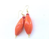 Orange large beaded drop earrings