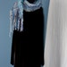 Ebb and Flow, a Short Wrap in blue grey with an edge of red mohair