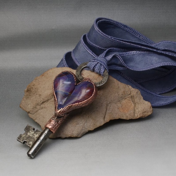 Copper electroformed repurposed vintage skeleton key with boro glass heart cab pendant