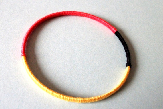 Black Yellow and Red Yarn Wrapped Bangle
