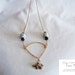Elephant Charm, White Resin Beads, Black Agate Beads, and Gold Chain Necklace