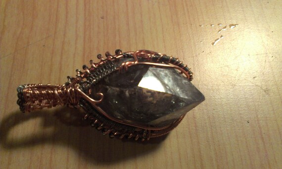 terminated tibetan wire wrapped quartz pendant