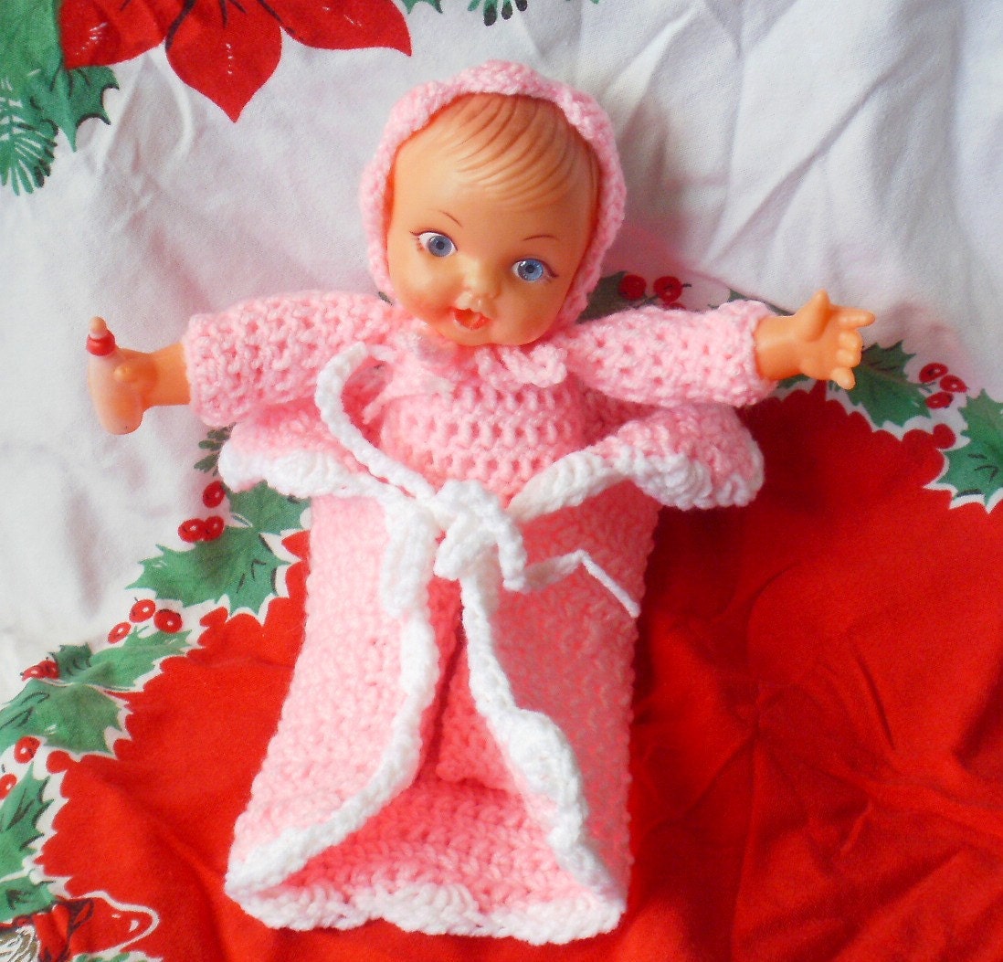Baby doll clothes patterns to help you dress up your baby dolls.